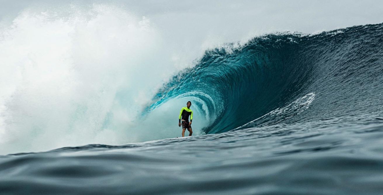 Zach Levine surfing Tahiti on a Muléke Daily Round-Squash, 2020